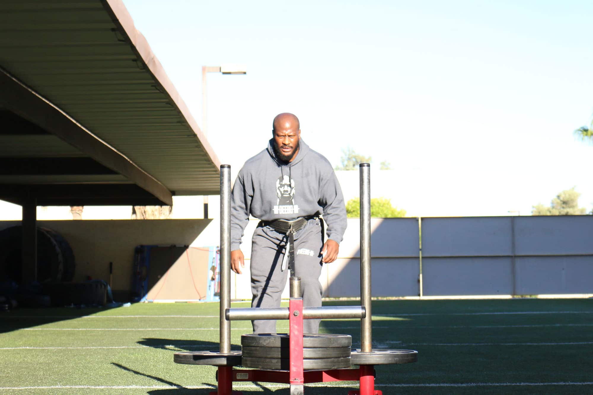 James Harrison working out outdoors.